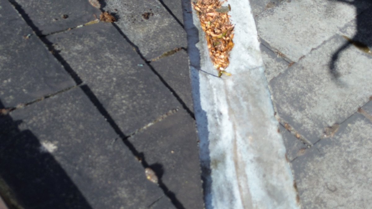 Roof Valley Damage, Mapperley Park, Nottingham photo shows the poor condition of the leadwork in a roof valley situated in Mapperley Park, Nottingham